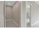 The closet has light wood flooring, recessed lighting, and ample space for storage at 731 S Missouri Ave, Lakeland, FL 33815