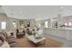 Open-concept living space with a modern kitchen, comfortable seating, and stylish decor at 731 S Missouri Ave, Lakeland, FL 33815