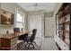 This home office has built-in shelving, a closet, and a window to let in natural light at 731 S Missouri Ave, Lakeland, FL 33815