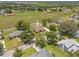 Sprawling single-Gathering home on a manicured lot, surrounded by lush greenery and a peaceful neighborhood at 7932 Ridge Pointe W Dr, Lakeland, FL 33810