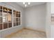 Dining area featuring tiled floor, chandelier, and a window that brightens the space at 7932 Ridge Pointe W Dr, Lakeland, FL 33810