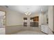 The carpeted dining room has lots of natural light and a built-in countertop and cabinets at 7932 Ridge Pointe W Dr, Lakeland, FL 33810