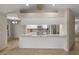 Well-equipped kitchen featuring stainless steel appliances, modern backsplash, and quartz countertops at 7932 Ridge Pointe W Dr, Lakeland, FL 33810