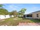 Well-maintained backyard boasts ample space for activities and features a screened-in lanai at 8904 Pebblebrooke Dr, Lakeland, FL 33810