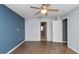 Inviting bedroom featuring tile floors and an open doorway to other rooms at 8904 Pebblebrooke Dr, Lakeland, FL 33810