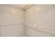 Clean and spacious closet with shelving and clothing rods at 8904 Pebblebrooke Dr, Lakeland, FL 33810