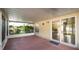 Screened patio with covered ceiling and view of the backyard at 8904 Pebblebrooke Dr, Lakeland, FL 33810