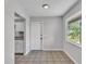 Clean kitchenette area featuring white cabinets and a well lit space at 1017 Fleming Ave, Lakeland, FL 33815