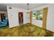 Inviting dining area featuring a window view with a retro hanging light fixture at 111 E Orange St, Davenport, FL 33837