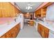 Well-lit kitchen with cabinets, appliances, and a vintage aesthetic at 111 E Orange St, Davenport, FL 33837