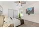 Bedroom with a ceiling fan, TV, and a queen bed at 113 Patrick Henry Rd, Bartow, FL 33830
