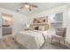 Cozy bedroom with a window for natural light and soothing neutral tones at 113 Patrick Henry Rd, Bartow, FL 33830