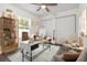 Stylish home office featuring a large desk, ample storage, and neutral decor at 113 Patrick Henry Rd, Bartow, FL 33830