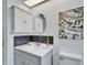 Bathroom vanity with gray cabinets, white countertop, and modern decor at 113 Patrick Henry Rd, Bartow, FL 33830