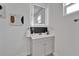 Close up of a bathroom vanity with an LED mirror and modern decor at 113 Patrick Henry Rd, Bartow, FL 33830
