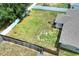 Aerial view of the fenced backyard, showcasing the home's location within the community at 1140 Stratton Ave, Groveland, FL 34736