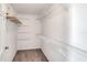 Walk-in closet with built-in shelving for optimal storage at 1140 Stratton Ave, Groveland, FL 34736