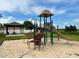 Community playground featuring a slide and gazebo in a well maintained area at 1140 Stratton Ave, Groveland, FL 34736