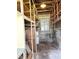 Unfinished basement area with a window, shelving, and concrete walls, ready for customization at 1215 E Edgewood Dr, Lakeland, FL 33803