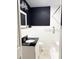 Updated bathroom with sleek fixtures, walk-in shower, and modern design offers a spa-like experience at 1215 E Edgewood Dr, Lakeland, FL 33803
