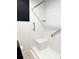 Bathroom features a modern walk-in shower with safety bars and a bench for comfort and convenience at 1215 E Edgewood Dr, Lakeland, FL 33803