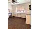 Classic kitchen with white cabinets, stainless steel appliances, and ample counter space offer functionality and style at 1215 E Edgewood Dr, Lakeland, FL 33803