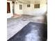 Bright, large room with windows for natural light and access to the porch at 1215 E Edgewood Dr, Lakeland, FL 33803