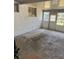 Enclosed porch with a small door and many windows for natural light at 1215 E Edgewood Dr, Lakeland, FL 33803