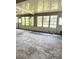 Bright, enclosed porch with many windows for natural light at 1215 E Edgewood Dr, Lakeland, FL 33803