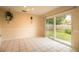 Bright dining area with tile flooring and sliding glass doors leading to the yard at 1410 Bramblewood Dr, Lakeland, FL 33811