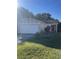 Charming single-story home with a well-maintained lawn and a two-car garage at 1410 Bramblewood Dr, Lakeland, FL 33811