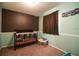 Cozy room with soft carpet and a window overlooking the backyard at 1410 Bramblewood Dr, Lakeland, FL 33811