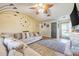 Inviting living room with wood-look floors, vaulted ceilings, and a comfortable sofa at 1434 Country Ridge Dr, Lakeland, FL 33801