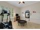 Exercise room with treadmill, rebounder, and two whiteboards at 1825 Pawnee Trl, Lakeland, FL 33803