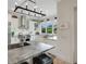 Bright kitchen features stainless steel appliances, granite countertops, and natural light at 1825 Pawnee Trl, Lakeland, FL 33803