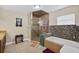 Bathroom showcasing a luxurious soaking tub, separate shower, and modern tile accents at 1922 Matthew Ct, Lakeland, FL 33813