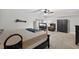 Comfortable bedroom featuring carpeted floors, a dresser, and a television at 1922 Matthew Ct, Lakeland, FL 33813