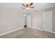 Spacious bedroom featuring neutral walls, carpet, and natural light at 1922 Matthew Ct, Lakeland, FL 33813