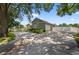 View of the home's exterior showcasing a wide driveway and attached two car garage at 1922 Matthew Ct, Lakeland, FL 33813