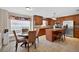 Eat in kitchen features granite counters, stainless steel appliances, and tile flooring at 1922 Matthew Ct, Lakeland, FL 33813