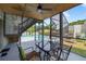 Enclosed patio with seating area overlooking the pool, perfect for outdoor entertaining at 1922 Matthew Ct, Lakeland, FL 33813