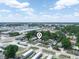 An aerial view showing the property location nearby businesses, neighborhood and the main road at 2120 Dille St, Lakeland, FL 33815