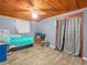 Bedroom with gray walls, a bed and a closet at 2120 Dille St, Lakeland, FL 33815