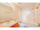 Bathroom features a bathtub and shower combination and single sink vanity at 222 Carpenters Way # 65, Lakeland, FL 33805