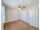 Bedroom featuring a ceiling fan, closet, and neutral paint at 222 Carpenters Way # 65, Lakeland, FL 33805