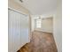 A large bedroom featuring neutral walls and carpet provides a calming, comfortable living space at 222 Carpenters Way # 65, Lakeland, FL 33805