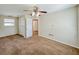 Spacious bedroom with closet and doorway to other rooms, offering comfort and functionality at 222 Carpenters Way # 65, Lakeland, FL 33805