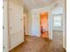 Hallway that provides access to three bedrooms and one bathroom at 222 Carpenters Way # 65, Lakeland, FL 33805