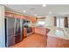Spacious kitchen with stainless steel appliances, wood cabinets and countertop, and a view of the backyard at 222 Carpenters Way # 65, Lakeland, FL 33805