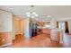 Bright kitchen with stainless steel appliances, wood cabinets, and wood flooring at 222 Carpenters Way # 65, Lakeland, FL 33805